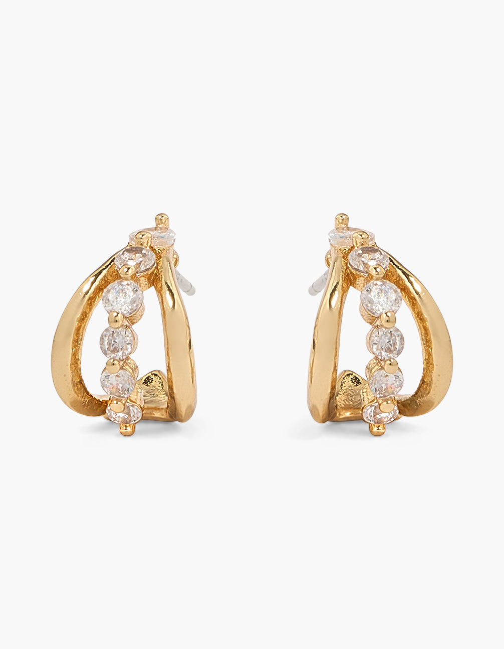 Showcasing mini graduated huggie hoop earrings crafted from gold plated material featuring cubic zirconia stones front view
